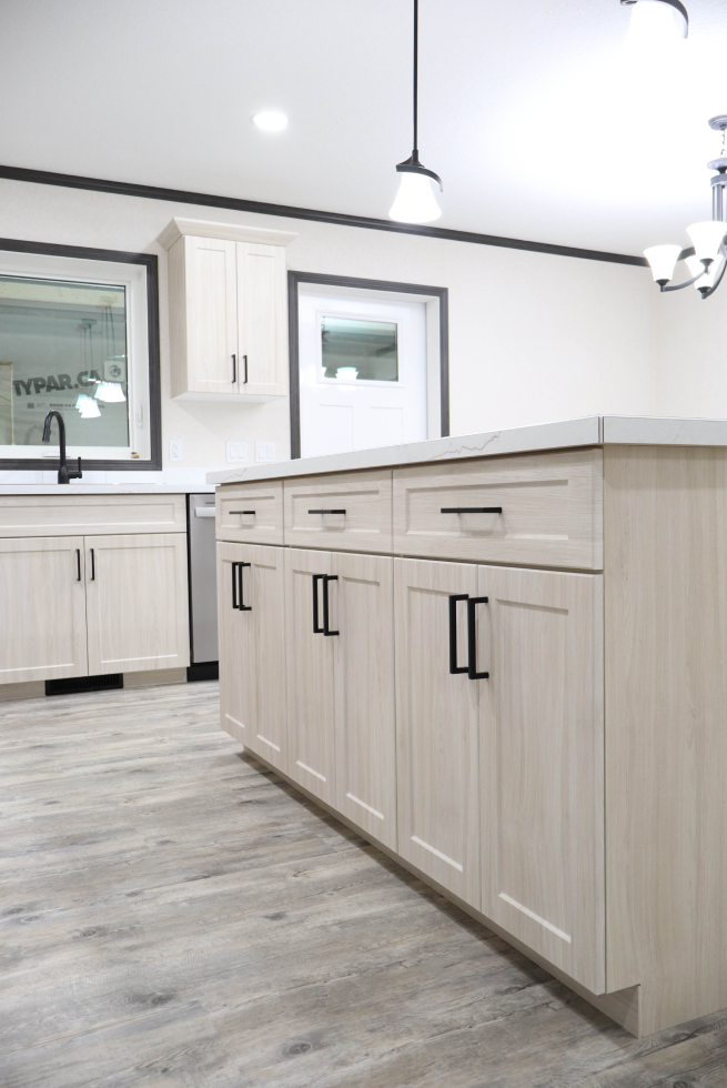 Large kitchen island with storage in The Cottage home