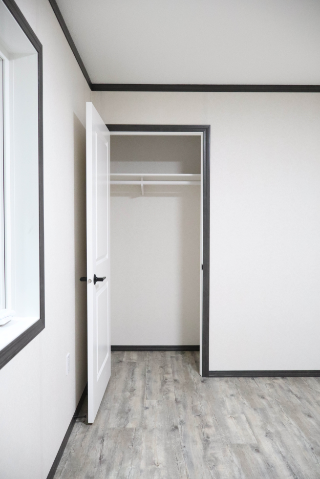 Walk-in closet space in The Cottage modular home